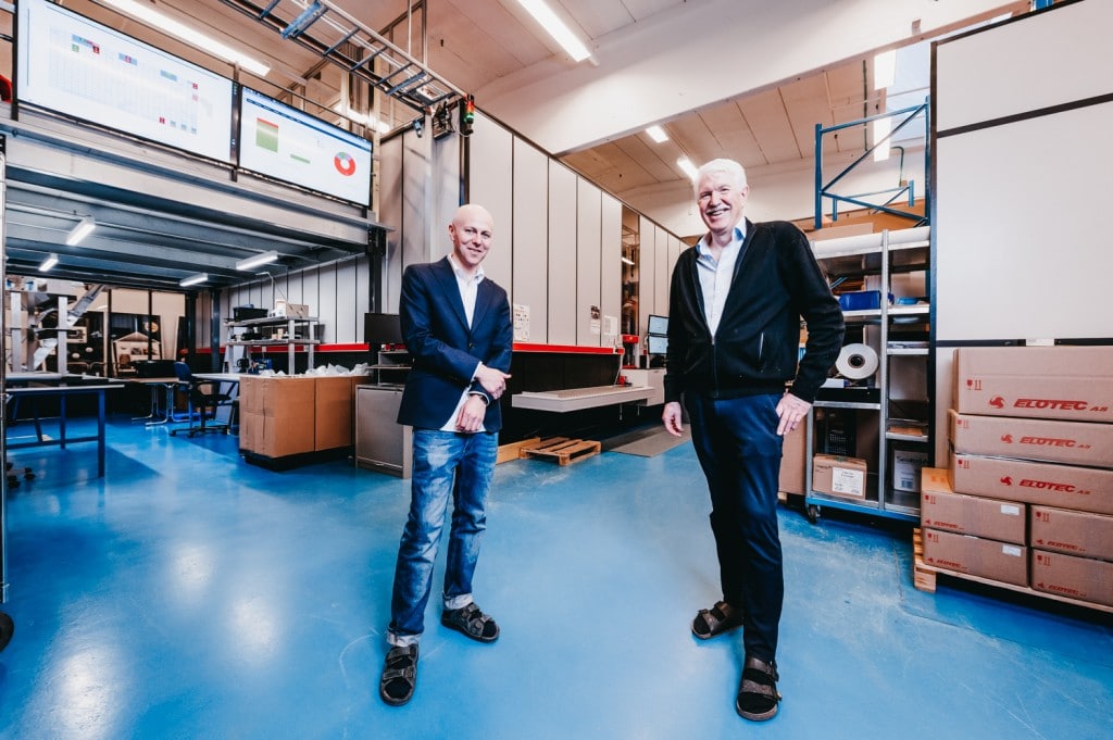 Roger Furnes and Jan Klevin standing inside the Elotec warehouse.