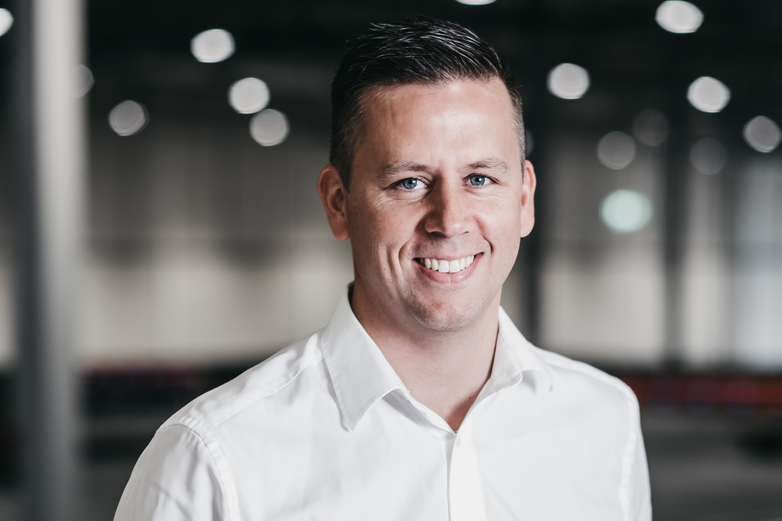 Portrait photo of a smiling Håvard Hallås, CCO Element Logic.