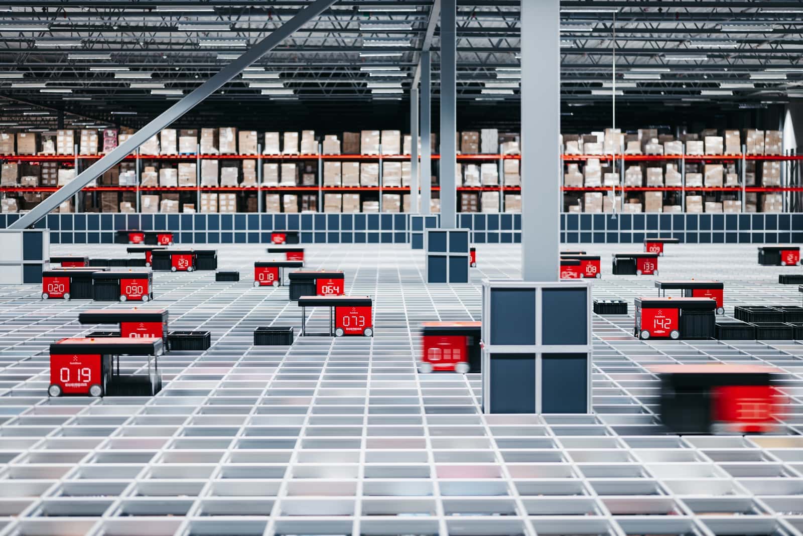 Robots on top of a grid with boxes in the background