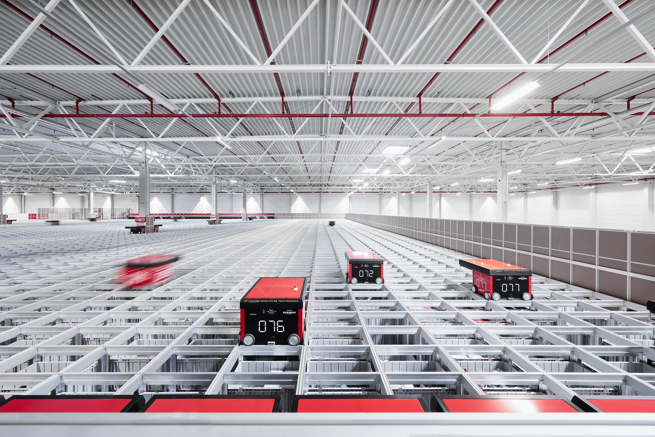 Robots roaming on top of the AutoStore grid